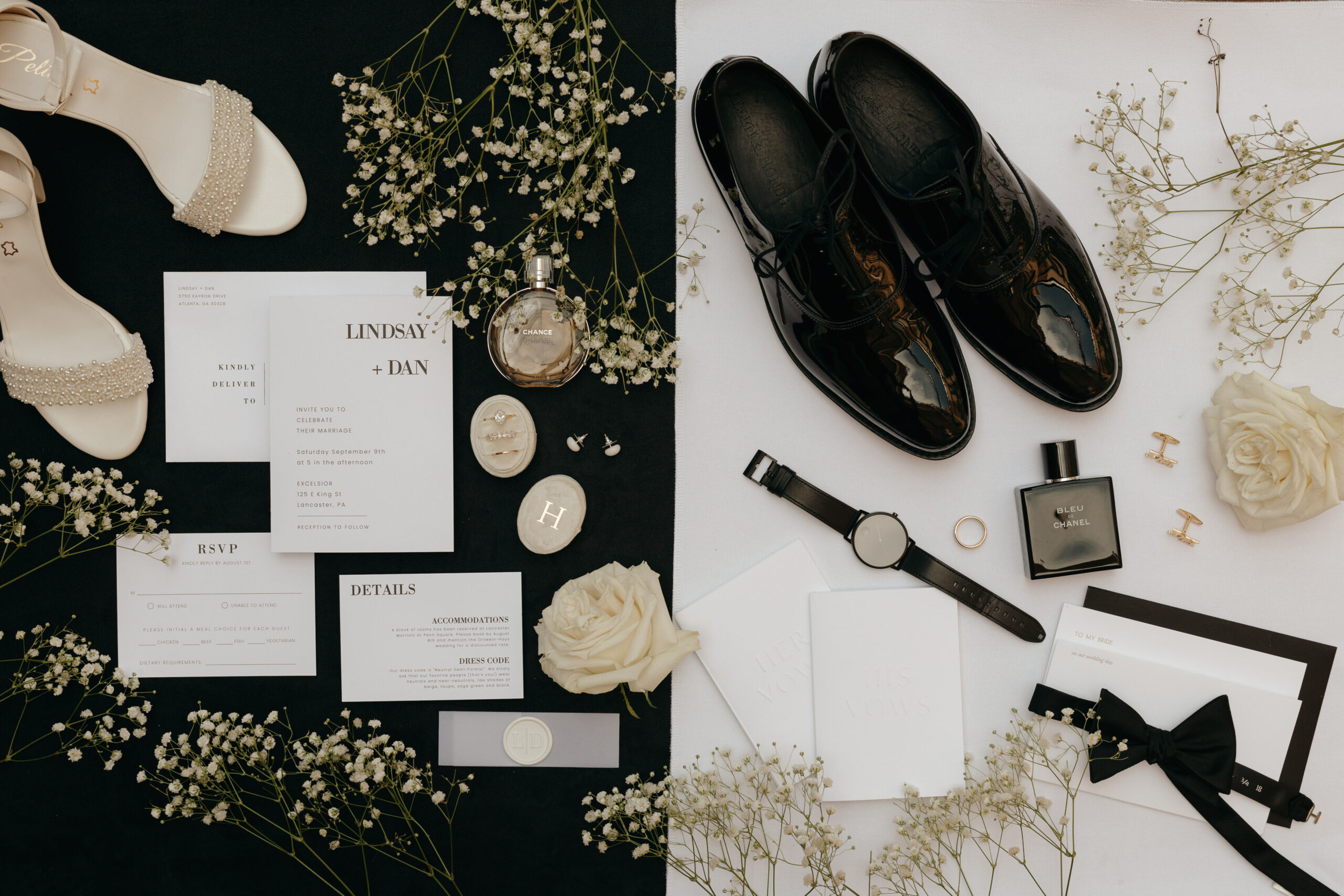 Detailed wedding photo of the invitations, baby's breath flowers, channel challenge, bow ties, cufflinks, and brides white detailed shoes.